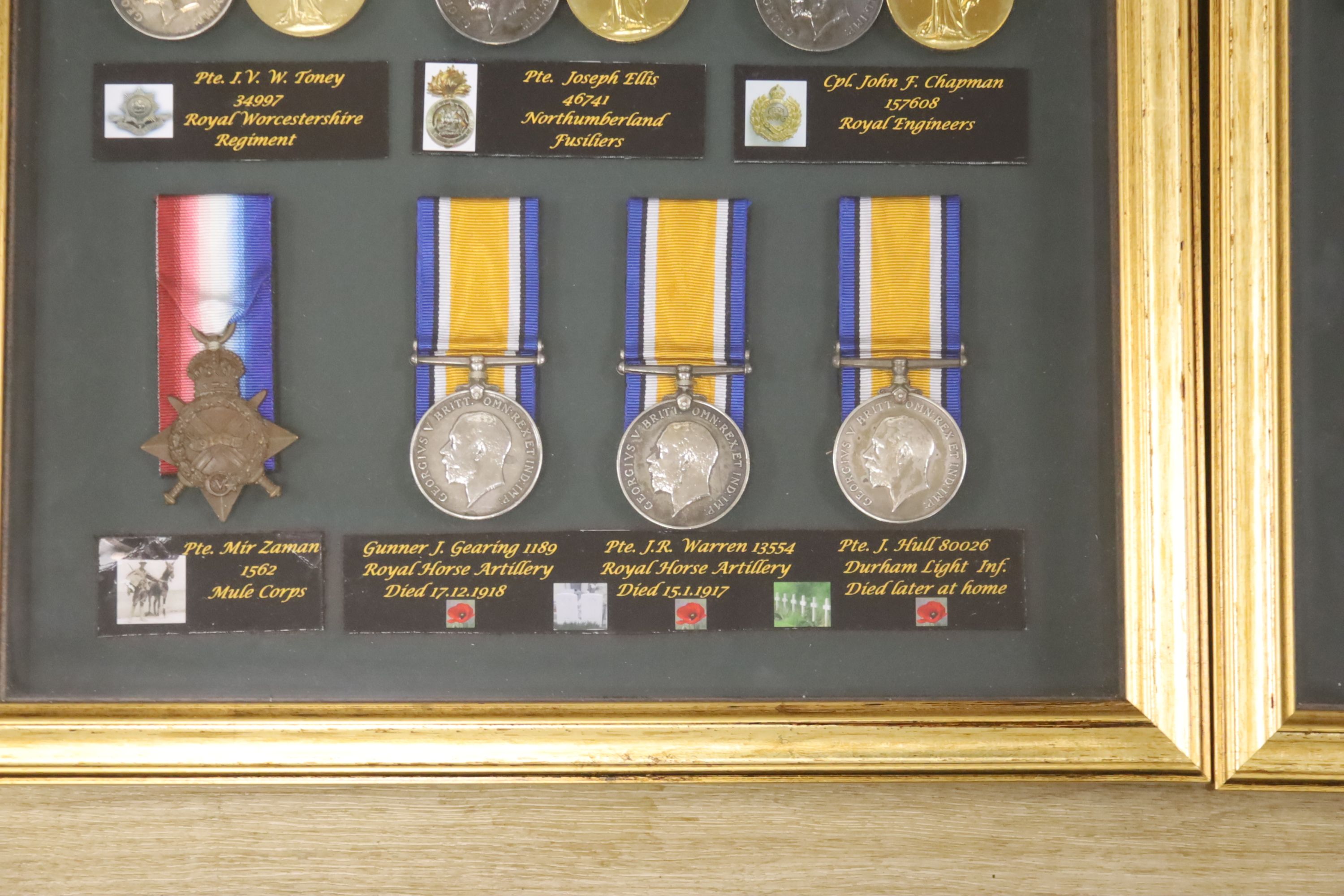 Two framed collections of WW1 medal groups